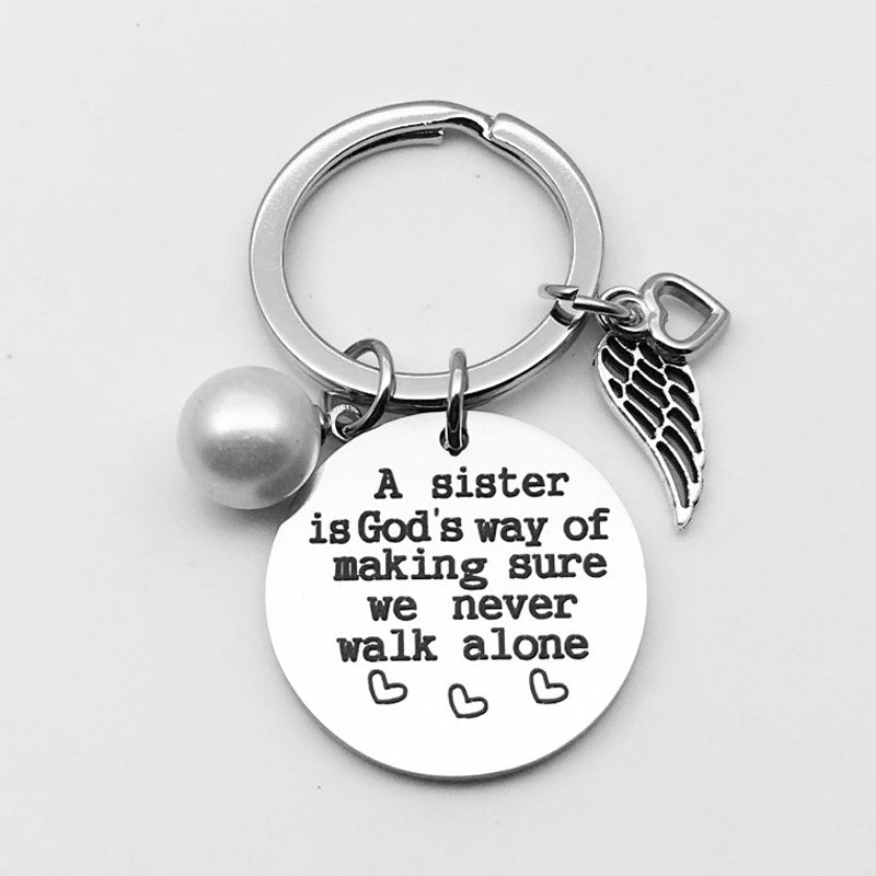 A Sister is God's Way of Making Sure We Never Walk Alone Keychain